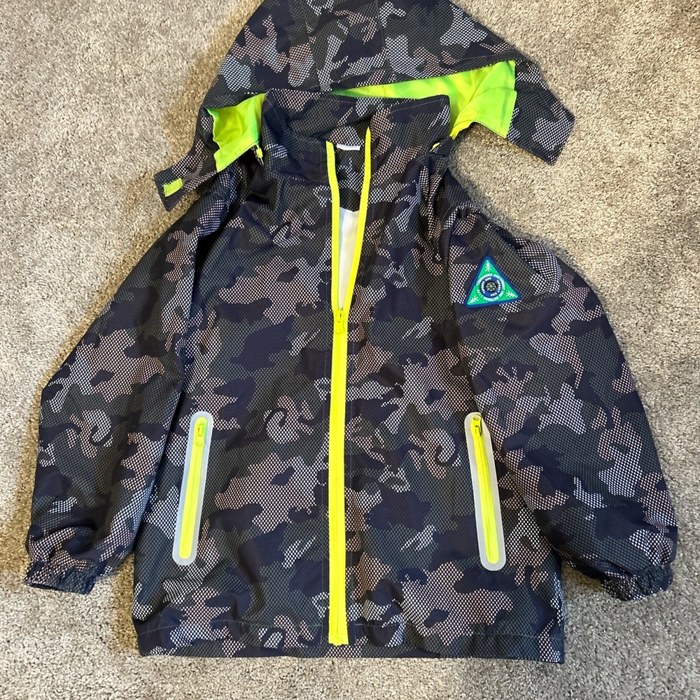 Boys Neon Trim Camo Rain Jacket - Black & Lime. Looks new